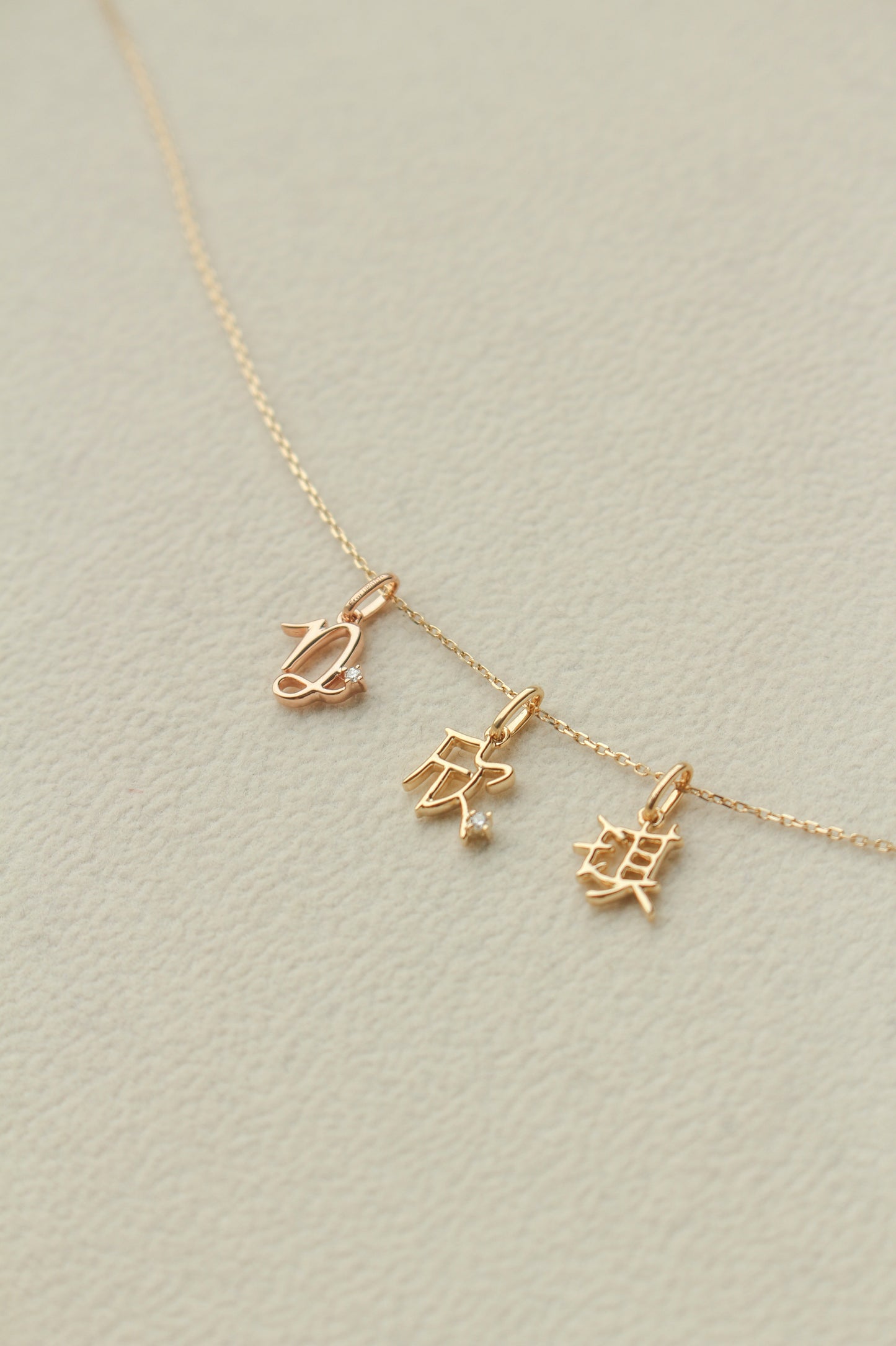 Audrey Gold Initial Pendant with Tiny Diamond (Medium)